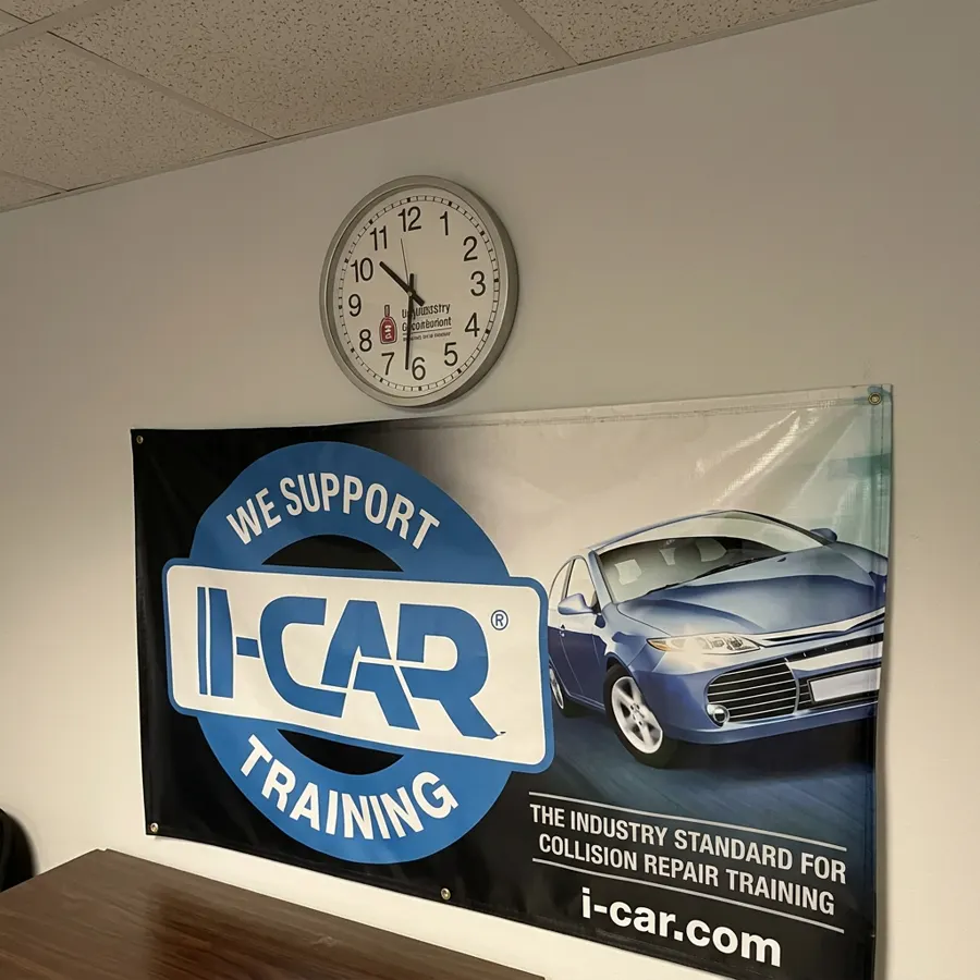 Icar training certification poster at Heritage Collision & Auto Body in Carlisle, PA